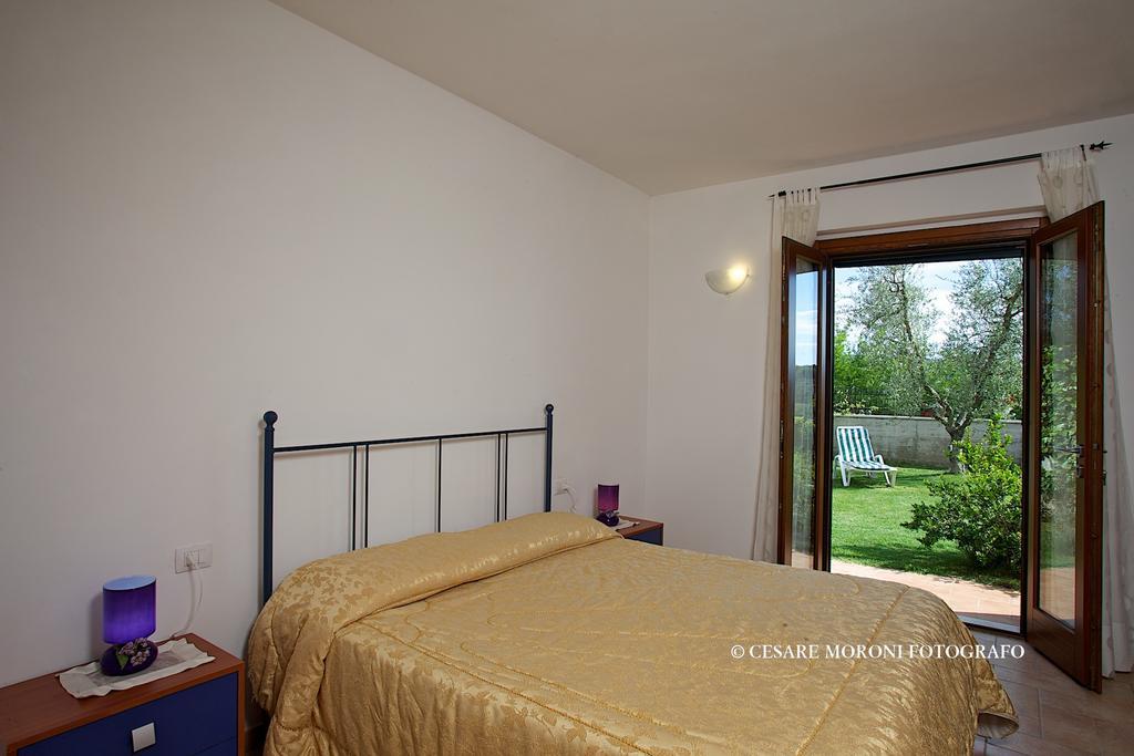 Residence Ai Campi Da Golf Saturnia Habitación foto